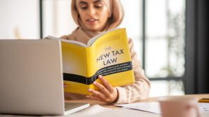 Muslim girl learning the new tax bill