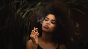 A woman using marijuana