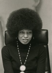 Angel Davis in a half length portrait by Bernard Gotfryd
