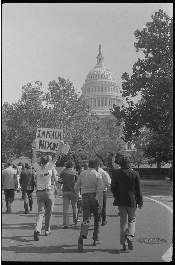 demonstrators with impeach nixon sign near the us caption washington dc