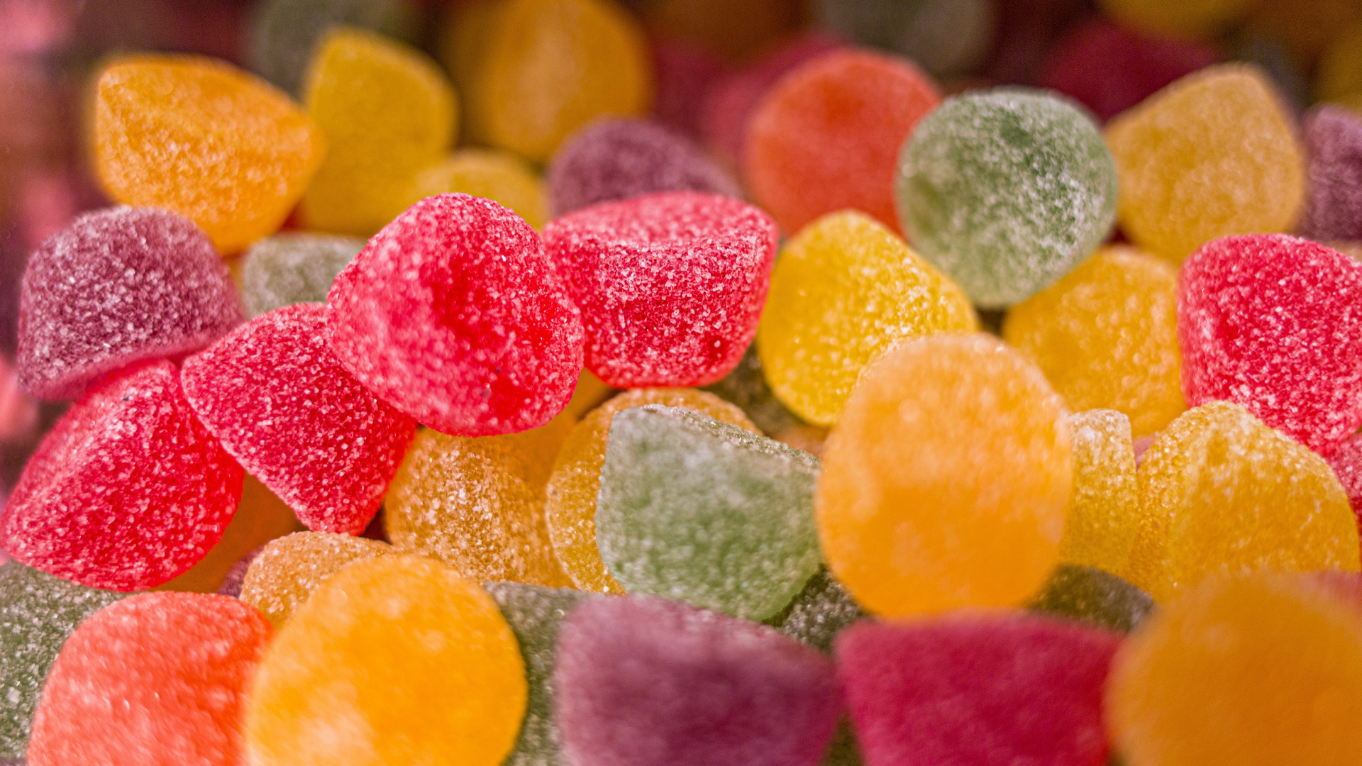 assorted flavors of gum drops close up for cbd edible dosage guide